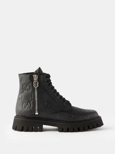 구찌 여성 GG debossed leather boots Black