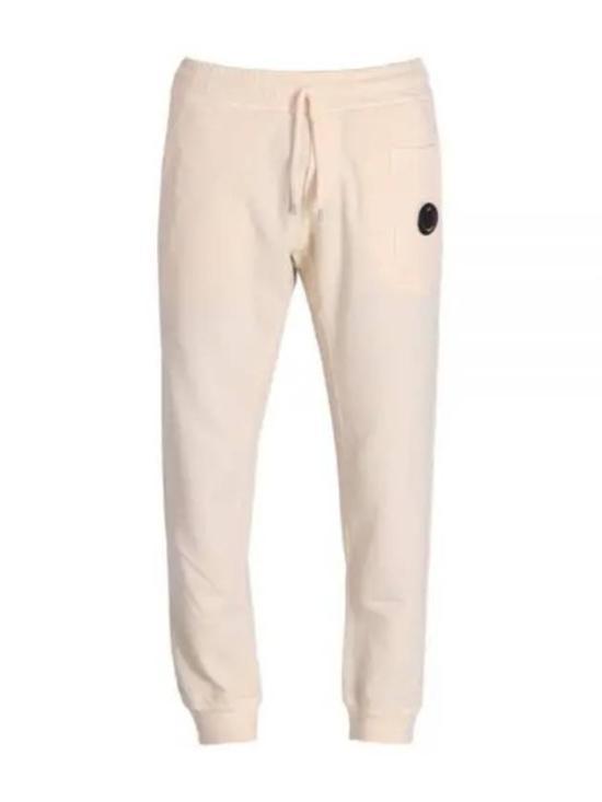 씨피 컴퍼니 트레이닝 조거 팬츠 16CMSP161A002246G402 PISTACHIO SHELL DOM - CP company