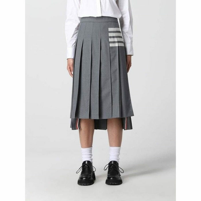 톰브라운 RWB 탭 드롭백 플레인 위빙 울 플리츠 스커 FGC400V 06146 035 - Thom Browne